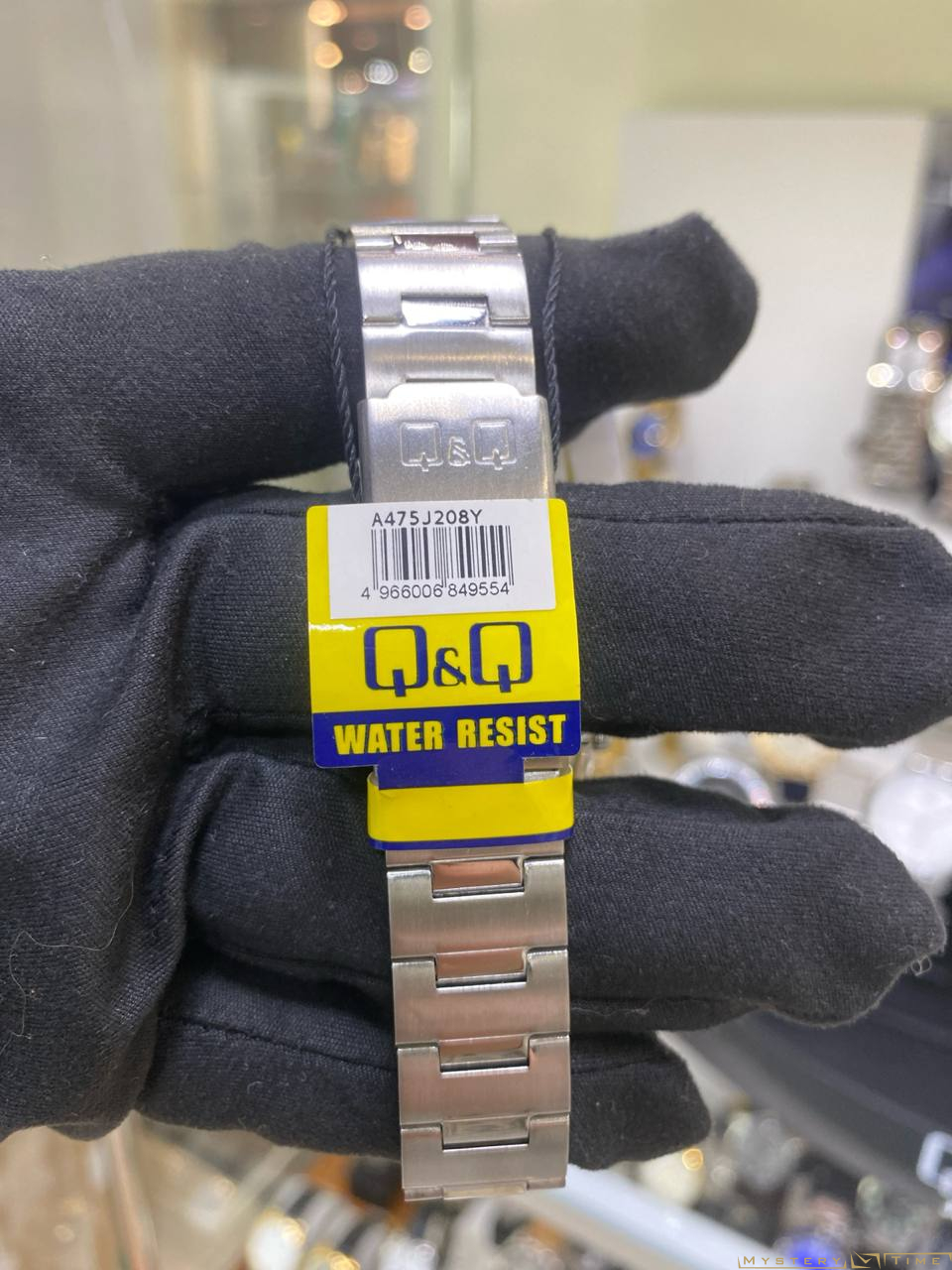 Q&Q A475J208Y
